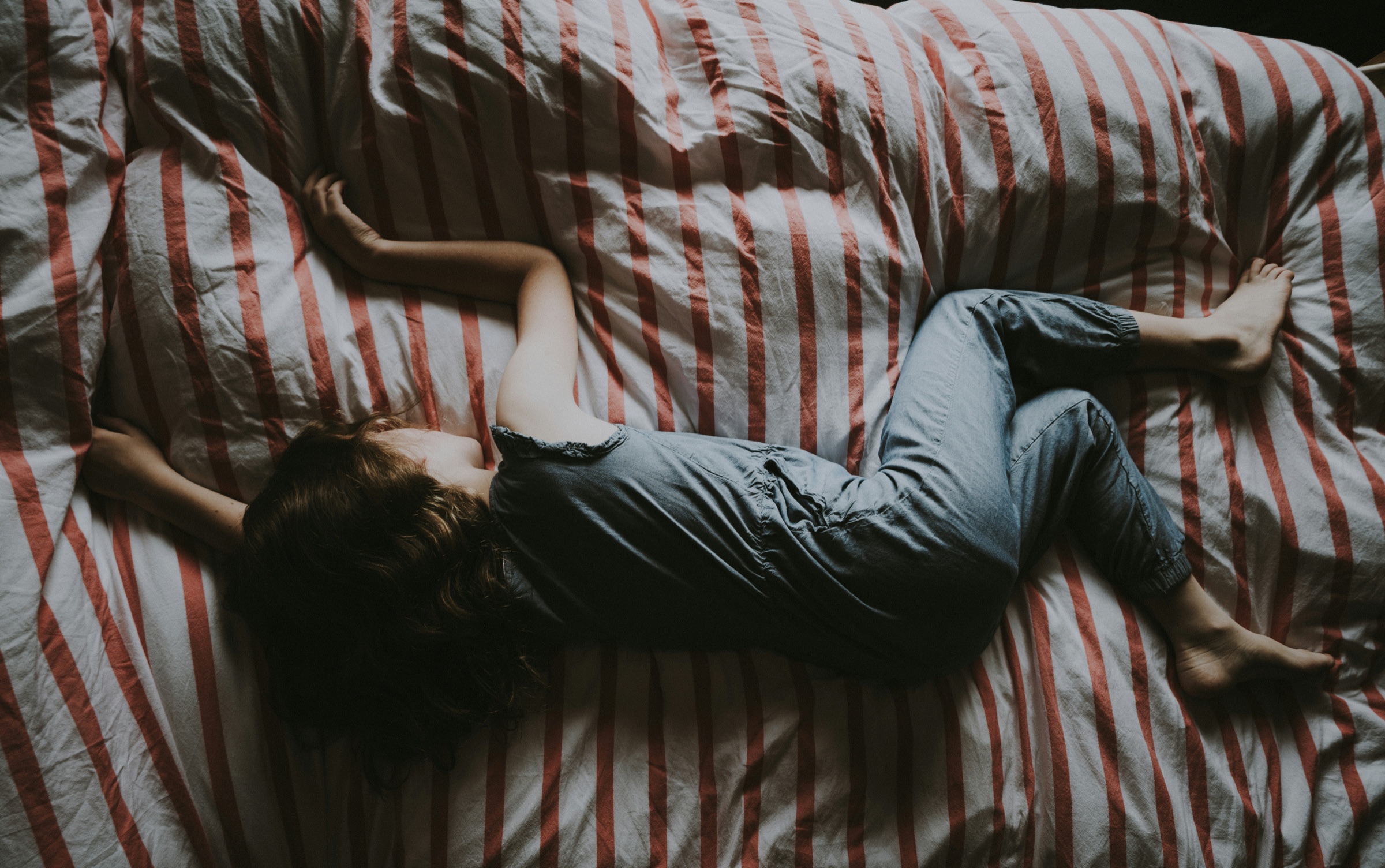 curled side sleeping position and lower back comfort