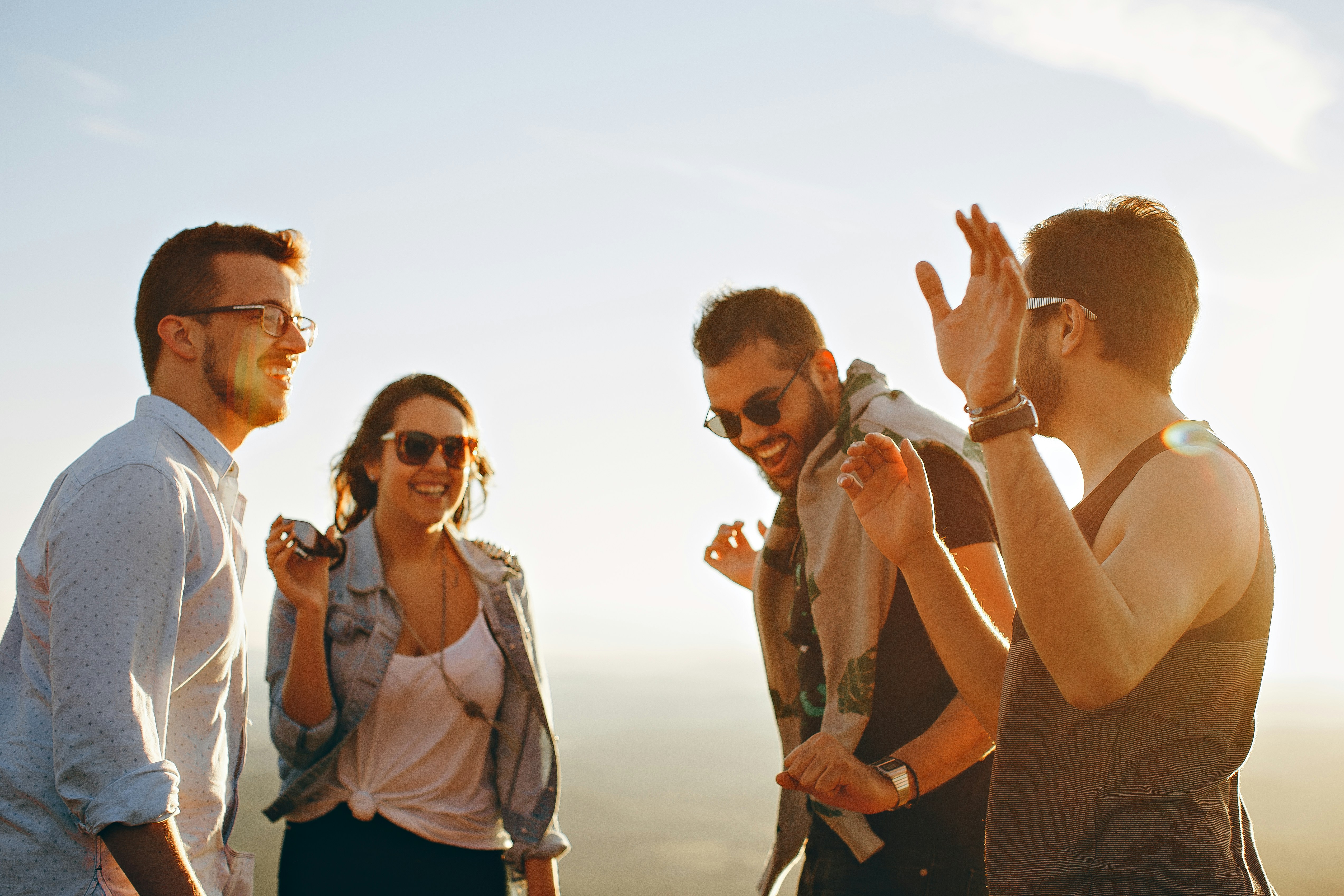 Friends sharing a warm, connected morning together, representing the presence, energy, and joy that come with genuinely restorative sleep